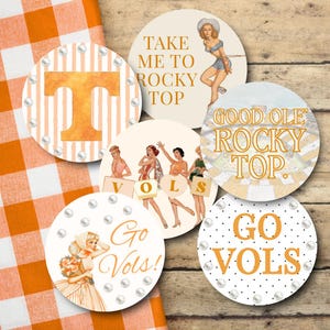 May include: A collection of round, decorative items with a vintage theme. The designs feature text like "Take Me To Rocky Top" and "Go Vols!" along with illustrations of women and the letter "T". Each item is bordered with faux pearls.