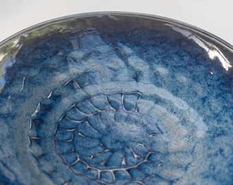 Hand made ceramic blue bowl with nautilus shell pattern