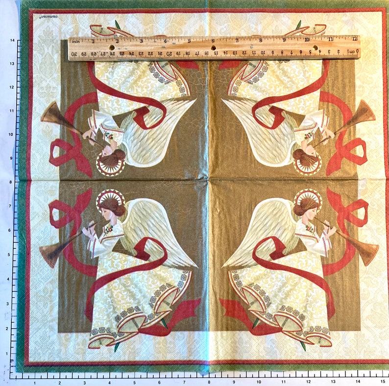 May include: Four angels playing trumpets, each with a red ribbon and gold wings, on a brown background with a green border. The angels are wearing white dresses with gold trim and have halos.