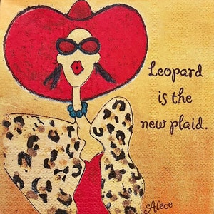 May include: A woman wearing a red hat and a leopard print dress. The text "leopard is the new plaid." is written on a yellow background.