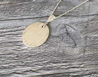 Sterling silver textured oval necklace
