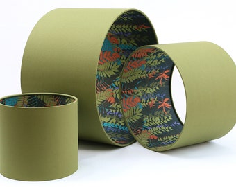 Trailing fern olive green lamp shades; double sided lampshade; botanical leaf decor; dark greens, orange, blue light, ceiling, table lamp