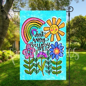 May include: A blue garden flag with a rainbow, sun, flowers, and the text "Don't worry be happy".