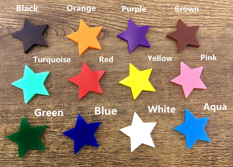 Op de afbeelding: Een set van 12 stervormige knutselbenodigdheden in verschillende kleuren, waaronder zwart, oranje, paars, bruin, turquoise, rood, geel, roze, groen, blauw, wit en aqua.