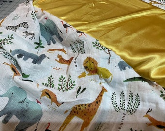 Jungle animal baby blanket measures 30x40, muslin front-backed and edged with silky perfect baby gift