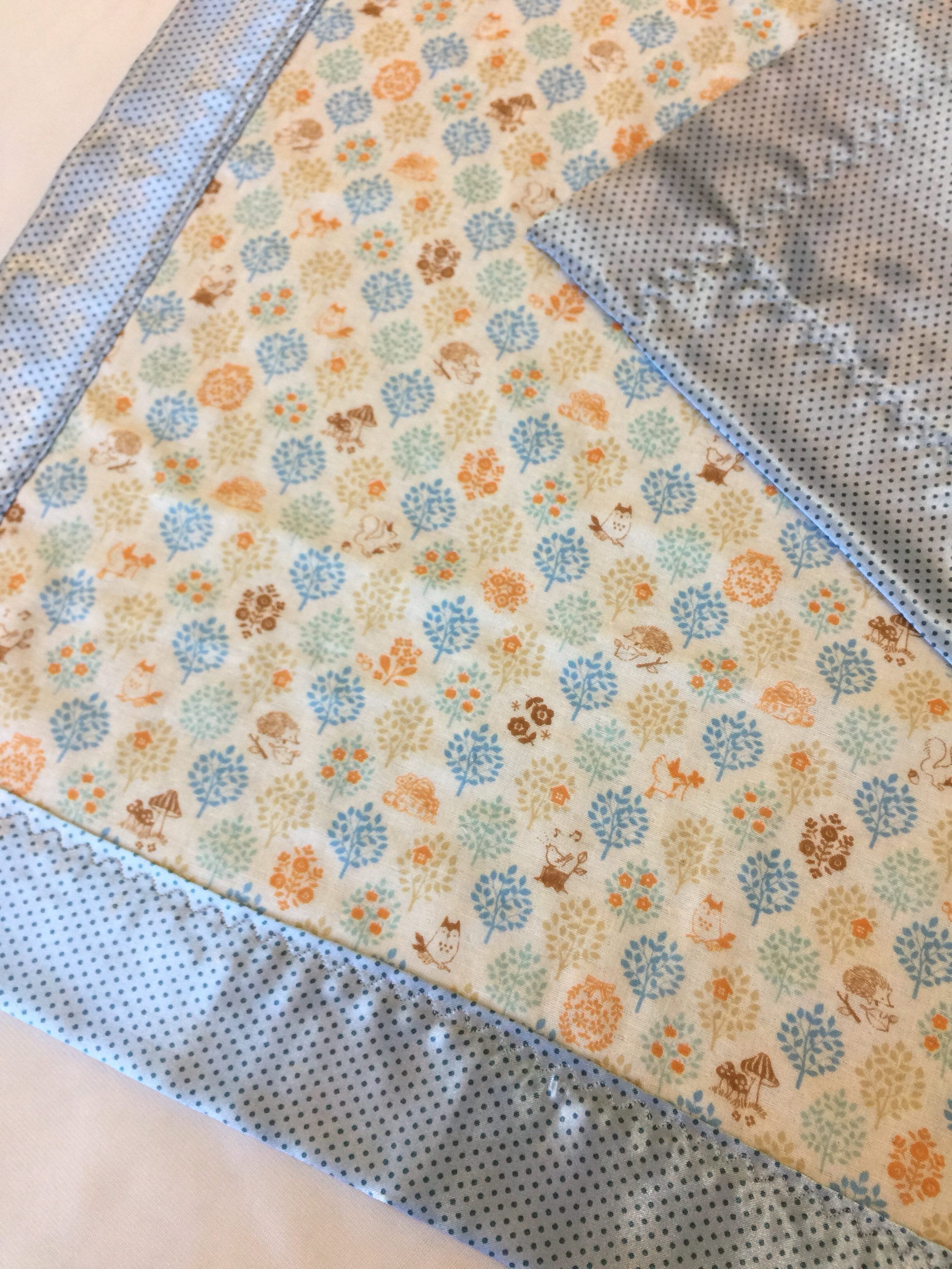 Woodland muslin lovey, muslin frontbacked and edged with coordinating silky fabric. This lovey