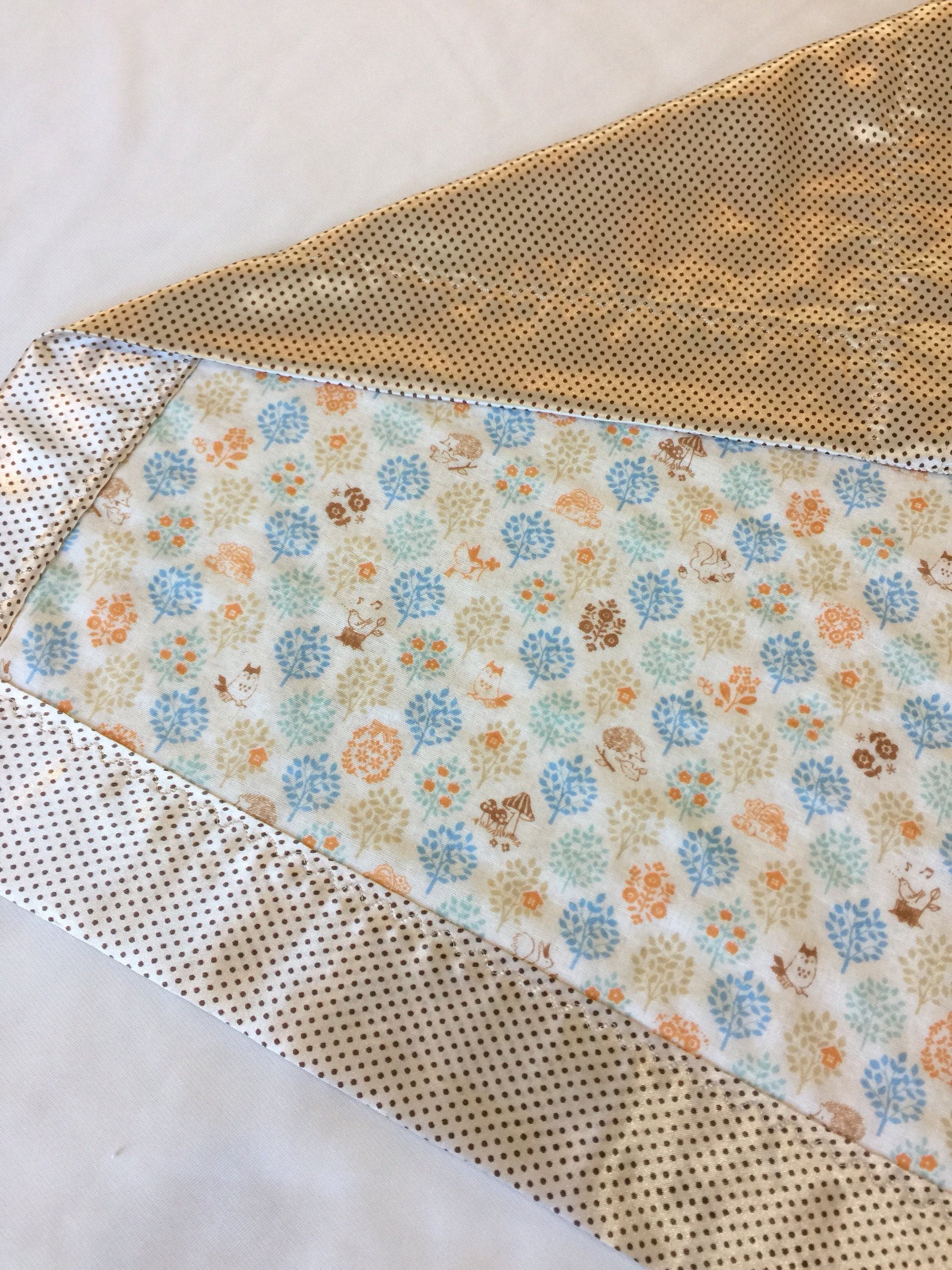 Woodland muslin lovey, muslin frontbacked and edged with coordinating silky fabric. This lovey