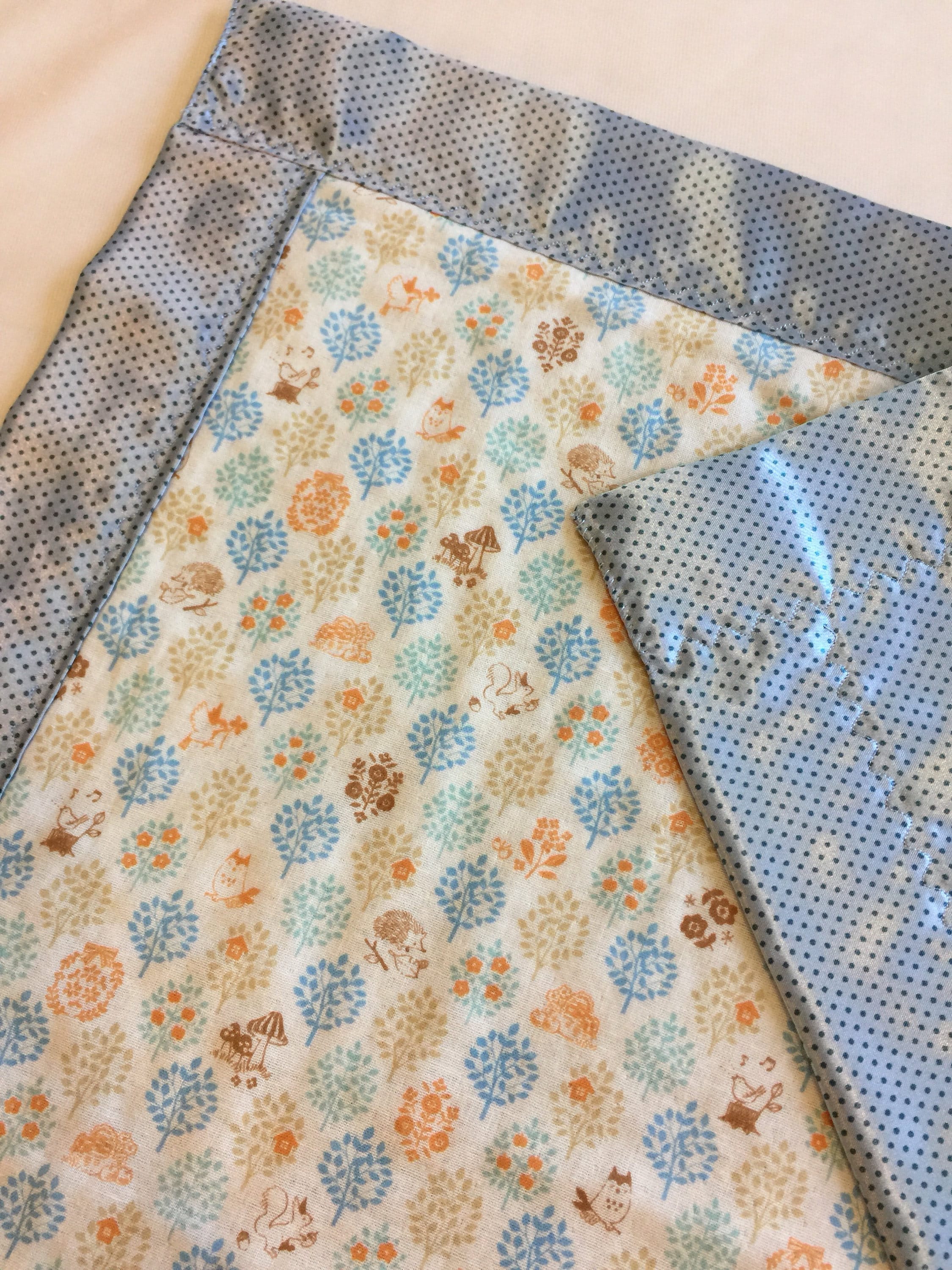 Woodland muslin lovey, muslin frontbacked and edged with coordinating silky fabric. This lovey