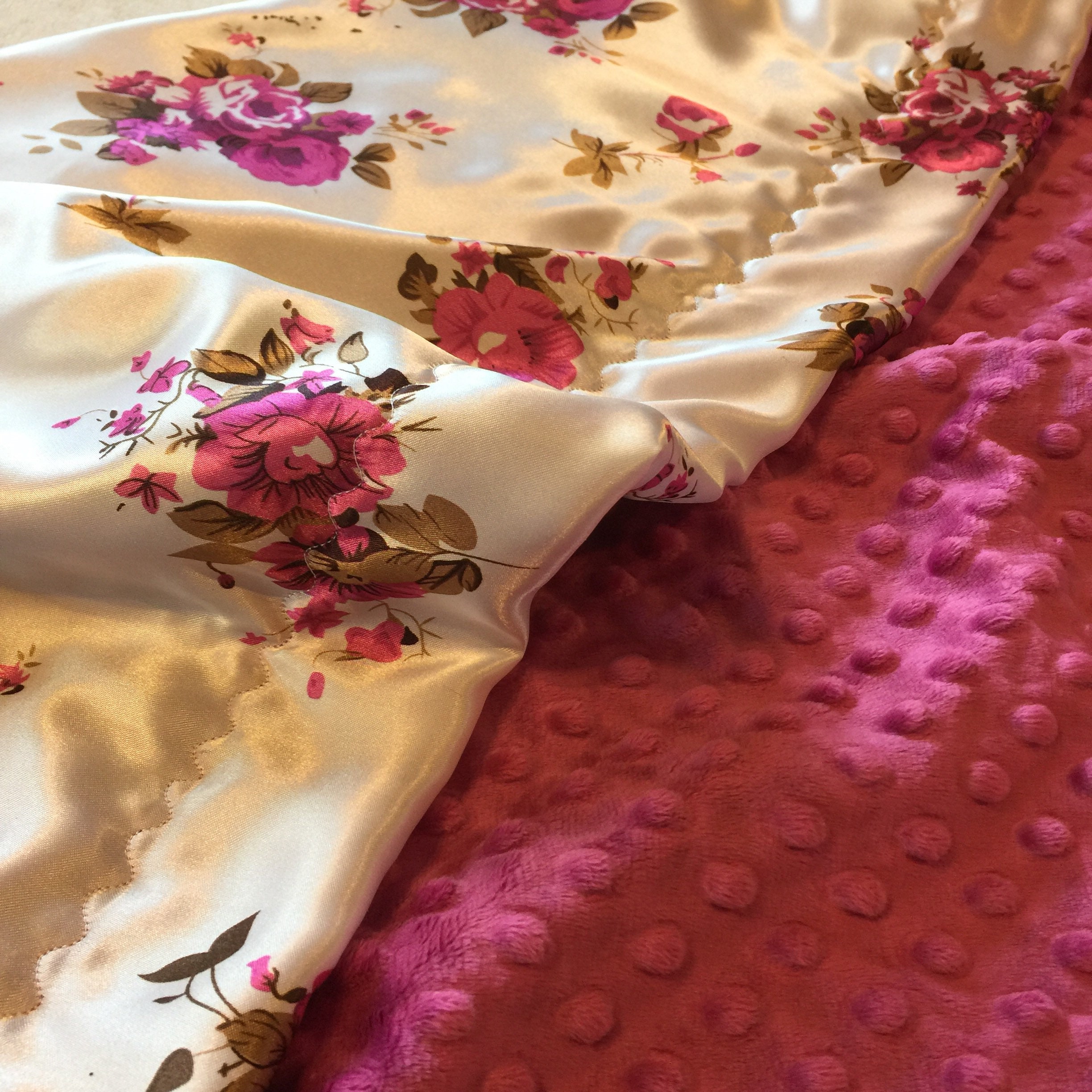 Silky Baby Blanket, raspberry minky front, backed and edged with