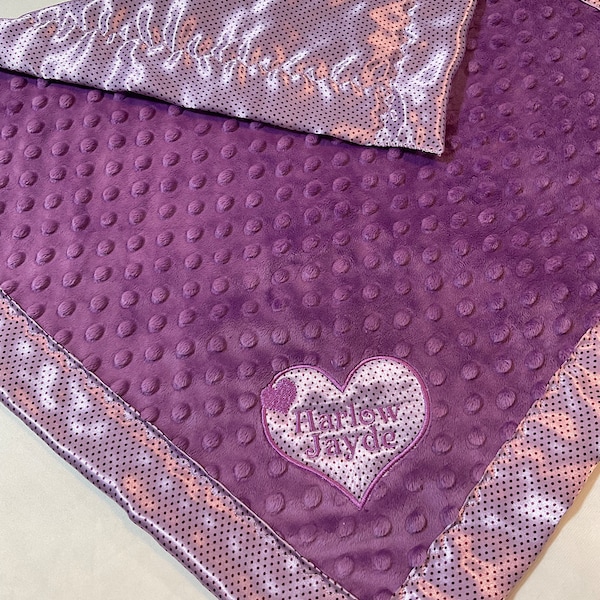 Soft and Cozy baby lovey, cozy purple dimple minky front-backed and edged with coordinating pin dot silky, measures approximately 20x20