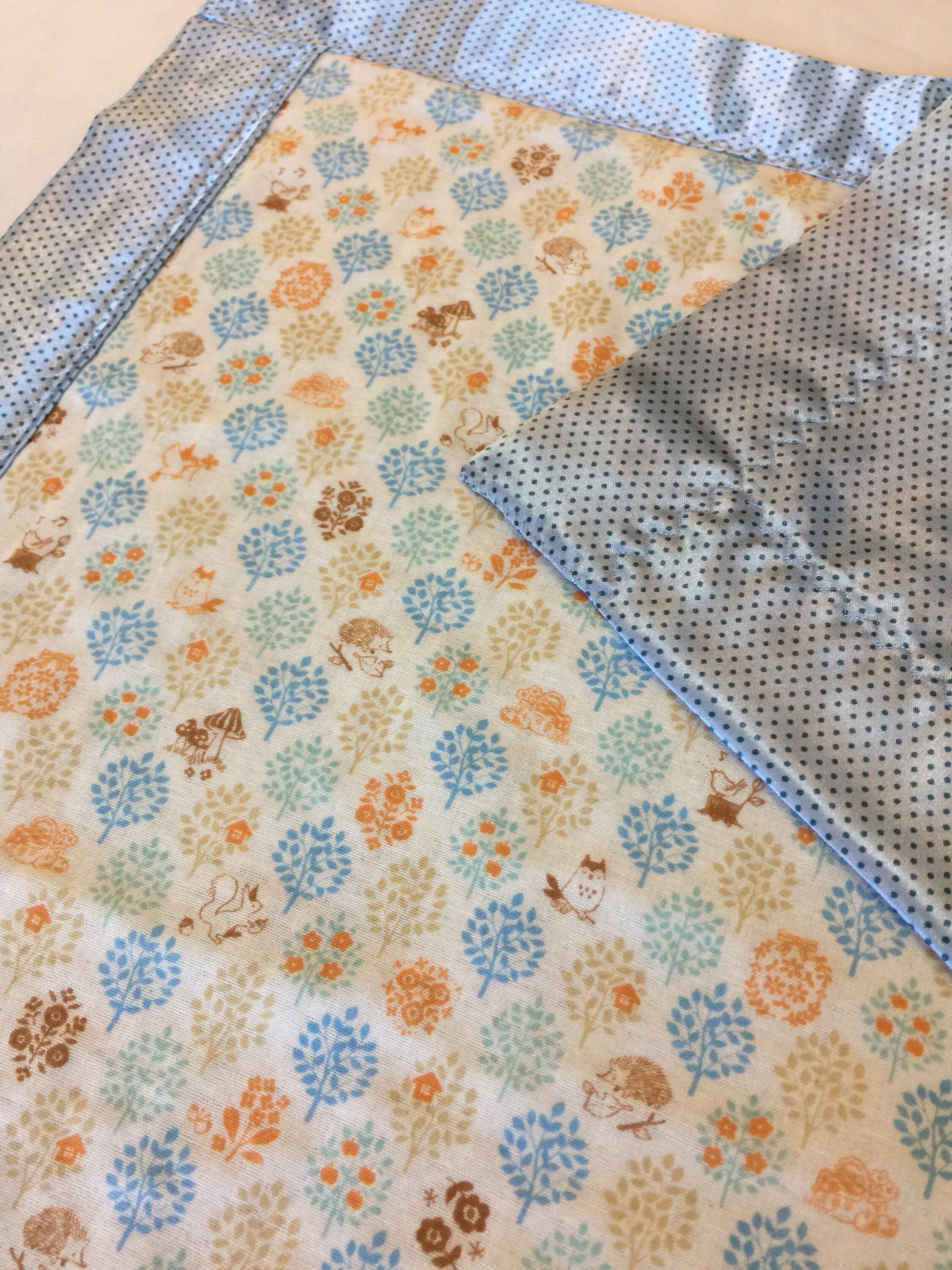 Woodland muslin lovey, muslin frontbacked and edged with coordinating silky fabric. This lovey