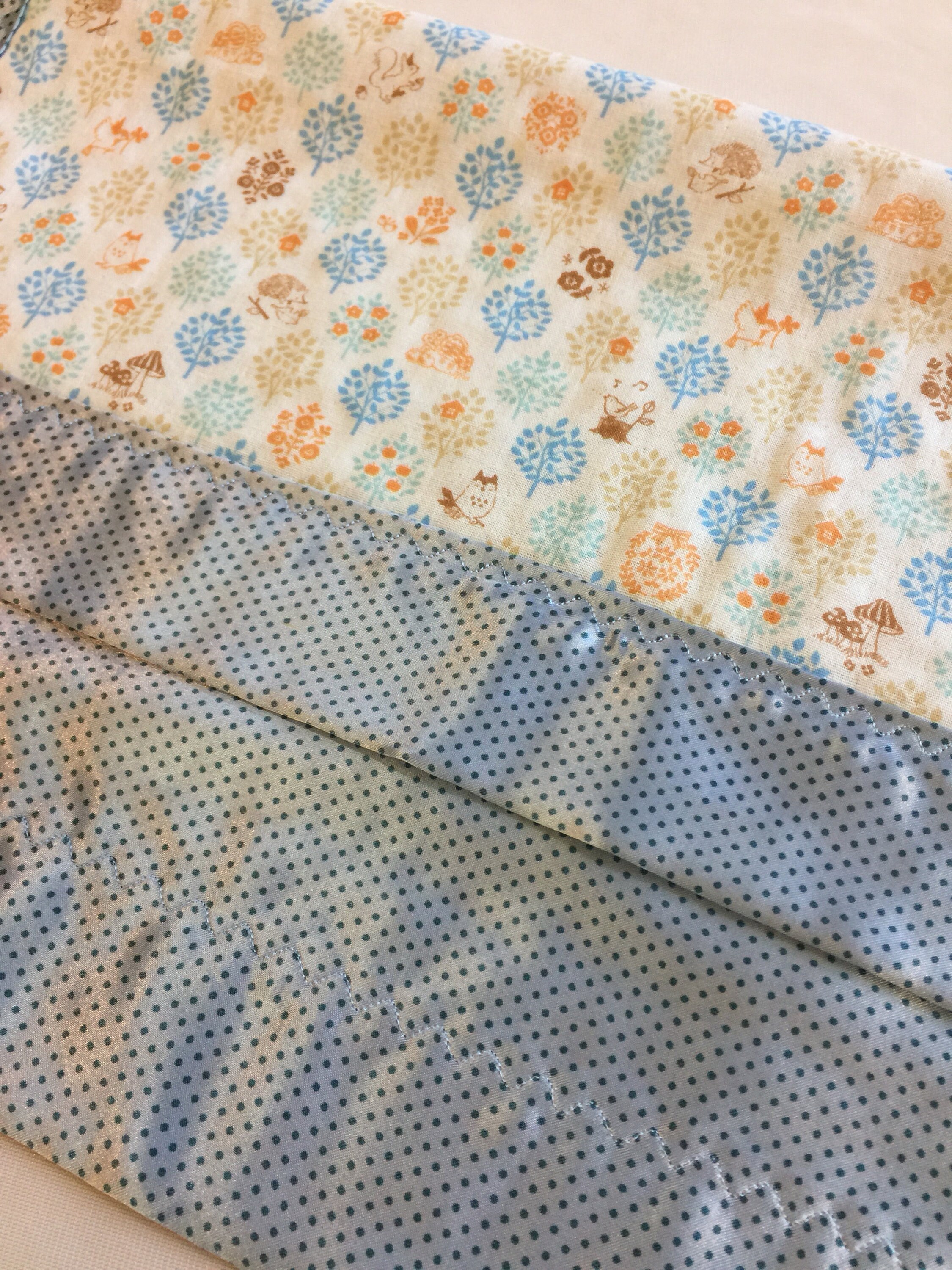 Woodland muslin lovey, muslin frontbacked and edged with coordinating silky fabric. This lovey