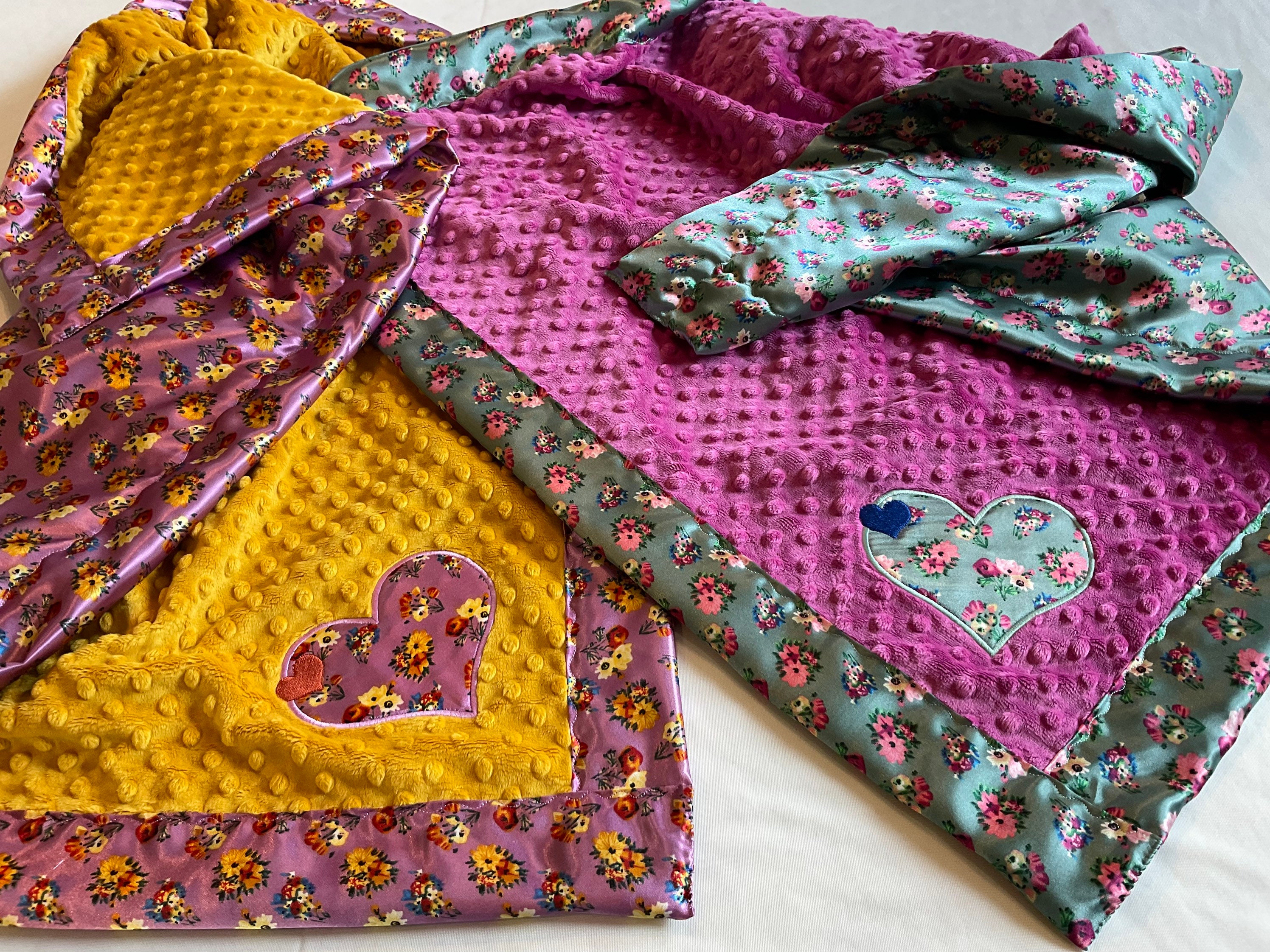 Baby blanket with satin trim, measures approximately 30x40, floral