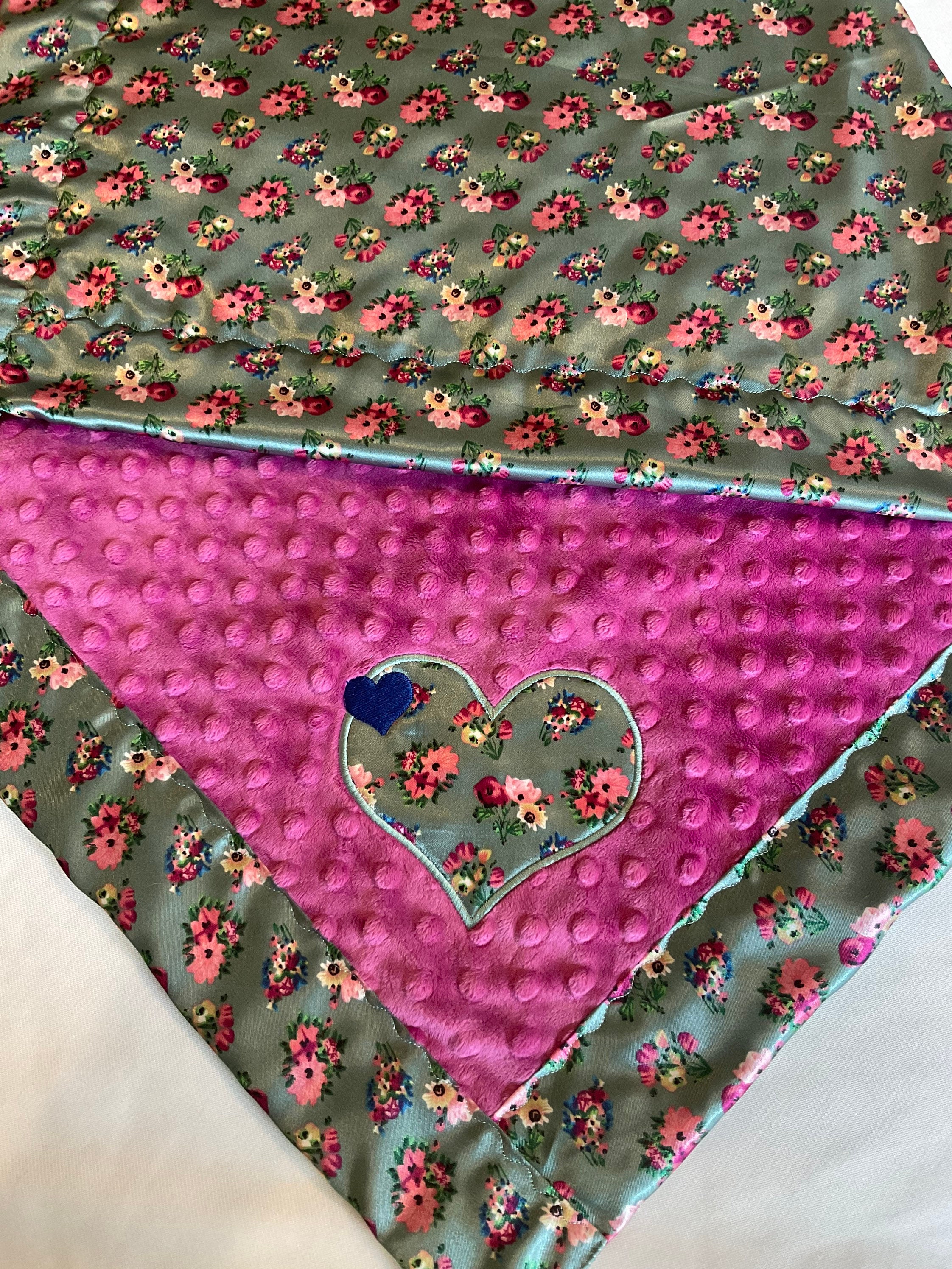 Baby blanket with satin trim, measures approximately 30x40, floral