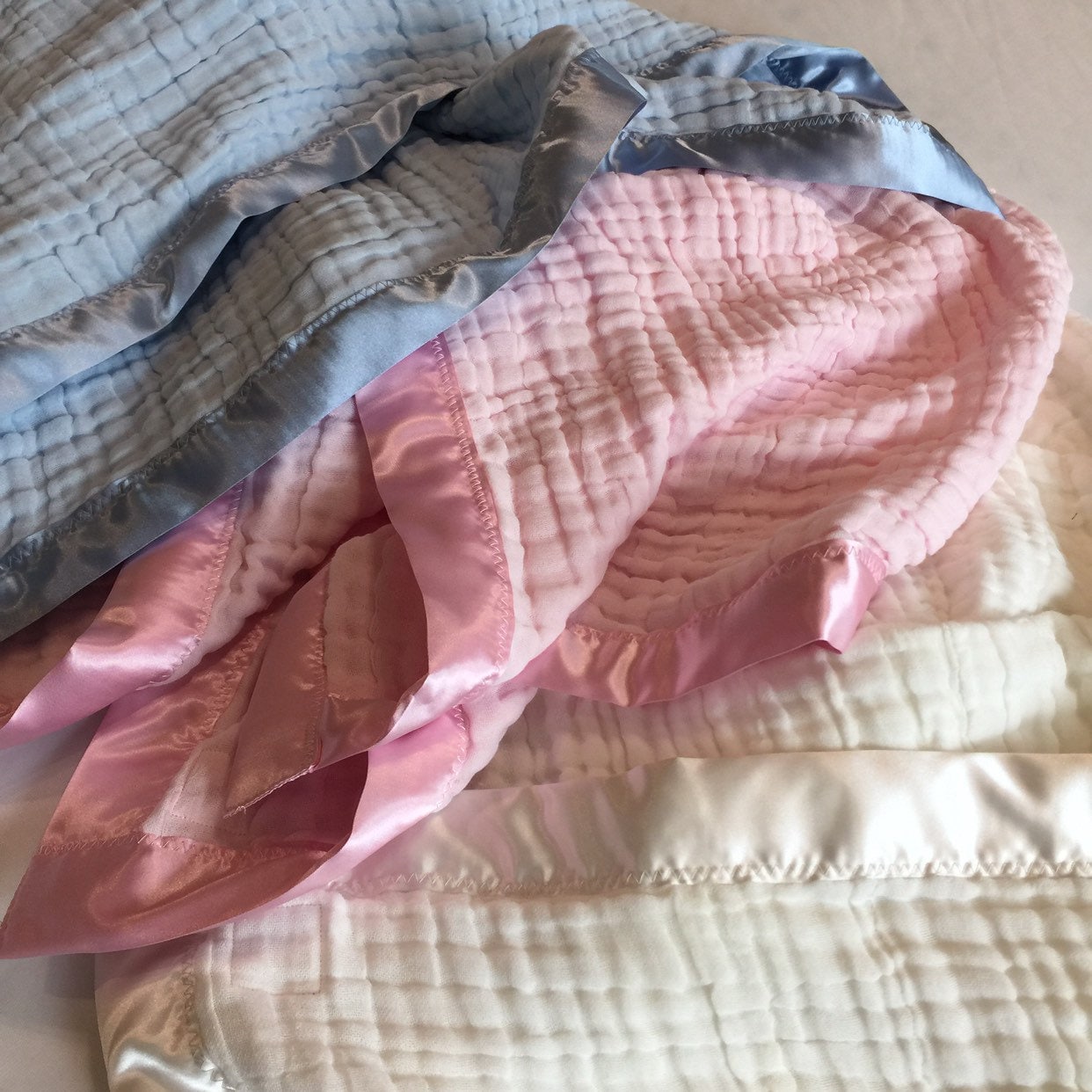 Baby Blanket, 6 layers of cotton muslin edged with satin trim, this