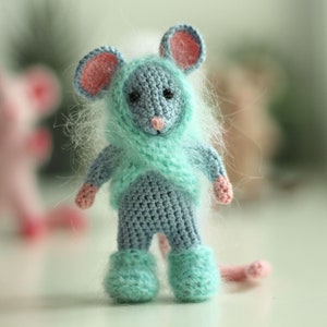 Create a sweet tiny amigurumi mouse using this easy and printable rat crochet pattern with poseable parts.