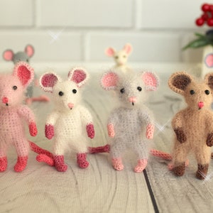 This miniature crochet mouse makes the perfect handmade gift, collectible figure, or whimsical home office decor item.