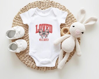 Christian Baby Girl Onesie – “Loved” John 3:16 Bible Verse – Faith-Based Newborn Outfit – Red Bow Baby Bodysuit – Religious Baby Gift