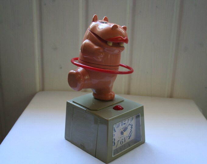 A Dancing Hippo Alarm Clock. Etsy