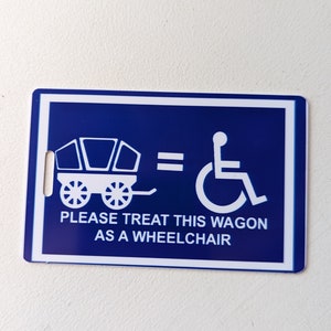 Toegankelijkheidshulpkaart/tag - Behandel de wagen als een rolstoelreistag, een wagentag.