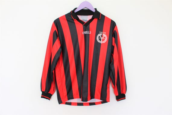 red and black striped soccer jersey