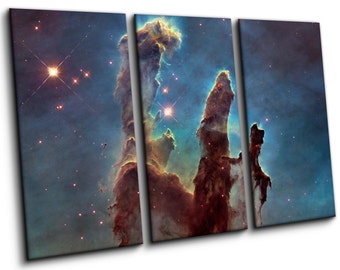 May include: A three-panel canvas wall art set depicting the Pillars of Creation in deep space. The image features towering columns of interstellar gas and dust in shades of dark brown, orange, and blue, illuminated by bright, glowing stars.