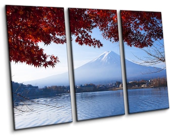 May include: A three-panel wall art set depicting a landscape with a snow-capped mountain peak in the distance, a calm lake in the foreground, and vibrant red maple leaves framing the top of the scene against a clear blue sky.