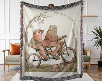 Toad And Frog Woven Blanket, Toad And Frog On A Bicycle, Vintage Book Art Couch Throw