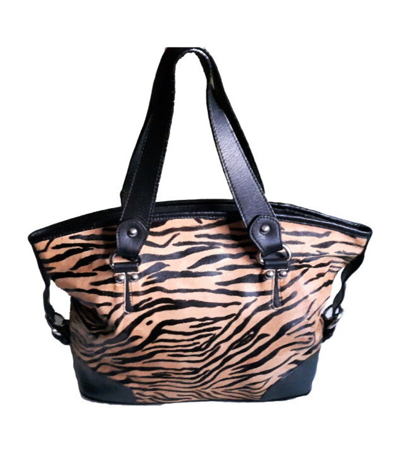 danier leather handbags canada