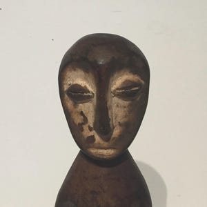 Figurine tribale africaine Lega en bois sculpté