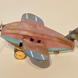 Mauve Rustic Metal Tin Toy Airplane