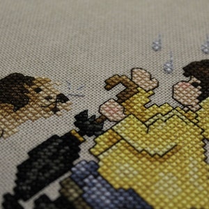 Boy and his Dog in the Rain Finished Cross Stitch Design from Stoney Creek Collection image 2