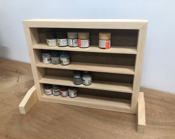 Benchtop paint storage shelf.  Narrow spacing