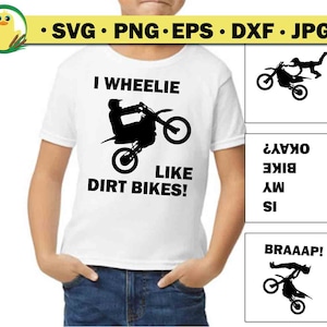 May include: A white t-shirt with a black graphic of a dirt bike doing a wheelie. The text on the shirt reads "I wheelie like dirt bikes!"