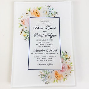 May include: A wedding invitation with a floral design in shades of pink, peach, and blue. The invitation announces the wedding of Dana Lamon and Robert Hozier on September 8, 2018, at 4:30 p.m. at Clarks Landing Yacht Club in Delran, New Jersey. The invitation also states that merriment will follow.