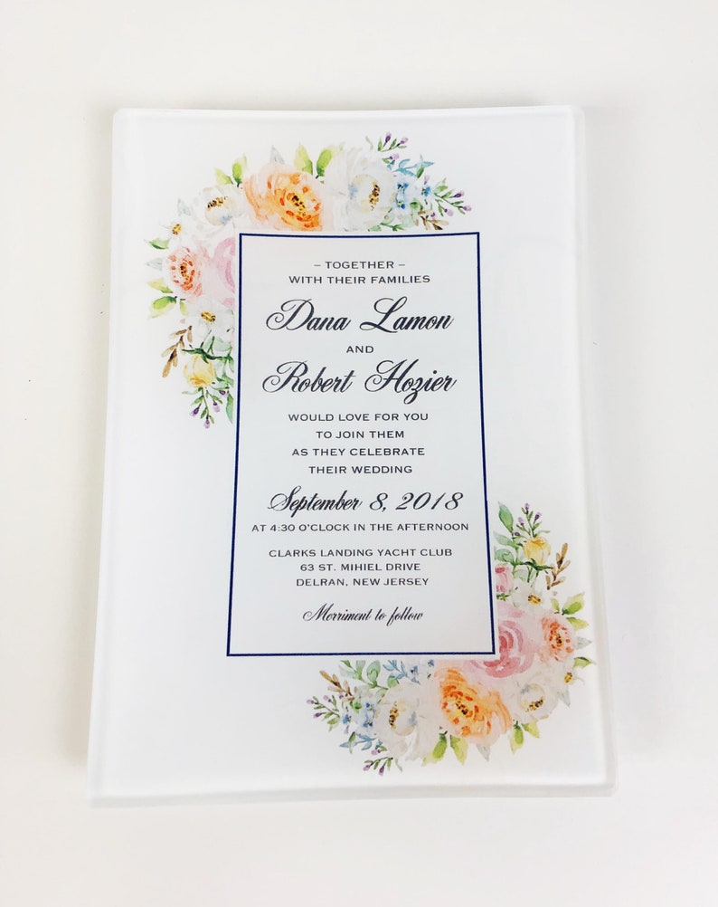 May include: A wedding invitation with a floral design in shades of pink, peach, and blue. The invitation announces the wedding of Dana Lamon and Robert Hozier on September 8, 2018, at 4:30 p.m. at Clarks Landing Yacht Club in Delran, New Jersey. The invitation also states that merriment will follow.