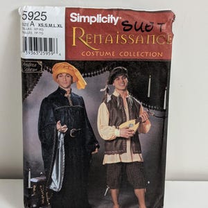 May include: Simplicity 5925 Renaissance Costume Collection sewing pattern envelope. The front shows two outfits: a long black robe with a yellow hat, and a cream shirt with a brown vest, plaid knickers, and a small stringed instrument.