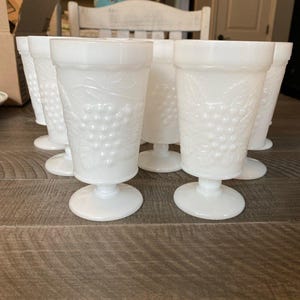 Vintage footed milk glass goblet cups with grapes and vine design