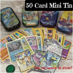 May include: A collection of Pok&eacute;mon trading cards and mini tins. The tins feature various Pok&eacute;mon characters and the text "50 Card Mini Tin". The cards are spread out, showcasing different Pok&eacute;mon and card details.