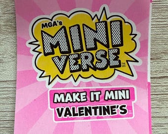 May include: A pink card with the text "MGA's Mini Verse" in a yellow speech bubble. Below, the text "Make It Mini Valentine's" is in a pink rectangle. The background has a pink radial pattern.