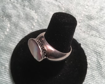 1960&#39;s Marked/Stamped “925” & “NF&quot; Sterling Silver Mother Of Pearl Ring. Size 7 1/4.