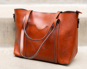 Rich brown tote with a sleek silhouette—everyday elegance and ample space for essentials.