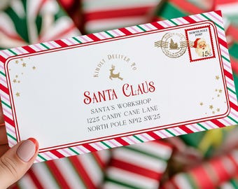 May include: A white envelope addressed to Santa Claus, with a red and green striped border and a North Pole postmark stamp. The envelope includes the address for Santa's Workshop on Candy Cane Lane. The background features wrapped gifts.