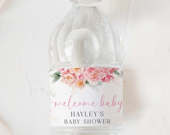 Pode incluir: Etiqueta de garrafa de água com design floral rosa e o texto "welcome baby Hayley's Baby Shower".