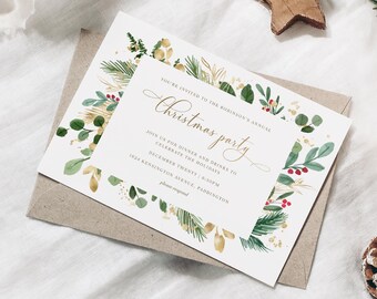 May include: A Christmas party invitation with gold script and a botanical border of green leaves, gold accents, and red berries. The invitation is on a white background, with the text "Christmas party". The invitation is placed on a brown envelope.