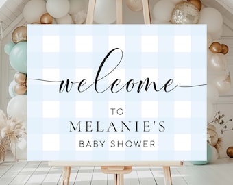 Op de afbeelding: Een blauw en wit gingham welkomstbord met de tekst "welcome to Melanie's Baby Shower".