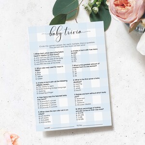 May include: A blue and white baby shower trivia game with questions about babies. The game has 10 questions with multiple choice answers. The person with the most correct answers wins.