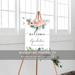 May include: A welcome sign for a bridal shower with a floral design in shades of pink, green, and blue. The sign reads "Welcome to Elyse Barton's Bridal Shower".