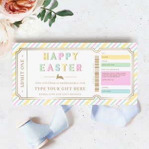 May include: A colorful printable Easter gift voucher with a striped background. The voucher says "Happy Easter" in colorful letters and has a space to write in a gift. The voucher also has spaces to write in the recipient's name, the giver's name, a special message, and the expiry date.