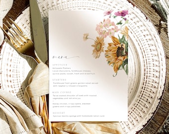 May include: A menu with a floral design featuring sunflowers and other flowers. The menu lists appetizers, starters, main courses, and desserts. The text on the menu includes: Antipasto Platters, Farmhouse fresh greens garden salad, Twice-cooked shoulder of lamb, Honey chicken, crispy speck, Tahitian Vanilla sponge.
